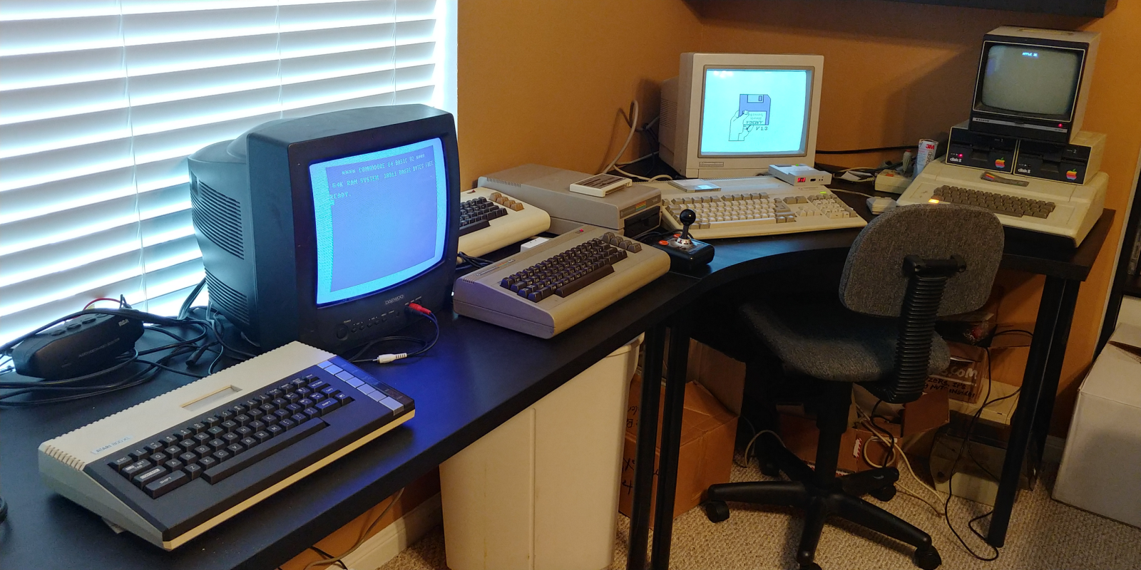Vintage Atari, Commodore, and Apple computers. Picture by author