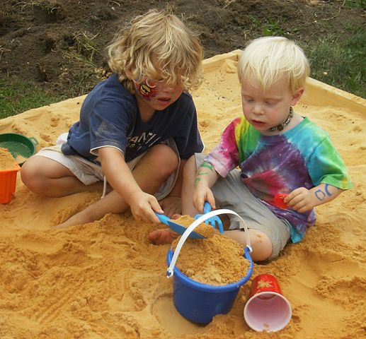 children playing in sandbox