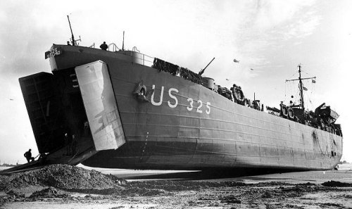 US Government photo of the LST-325 temporarily stranded during low tide on the Normandy Beach. (June 12 1944)