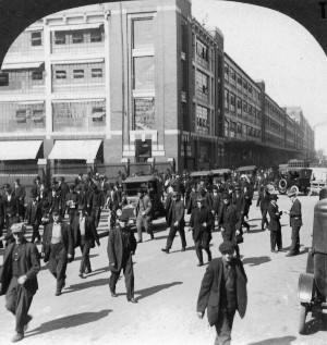 Workers leaving the Ford Motor Company plant in Detroit, MI