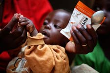 African child eating