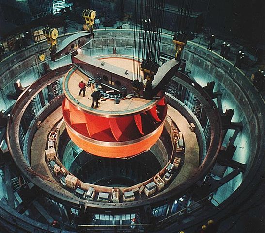 A water turbine being assembled at the Grand Coulee Dam