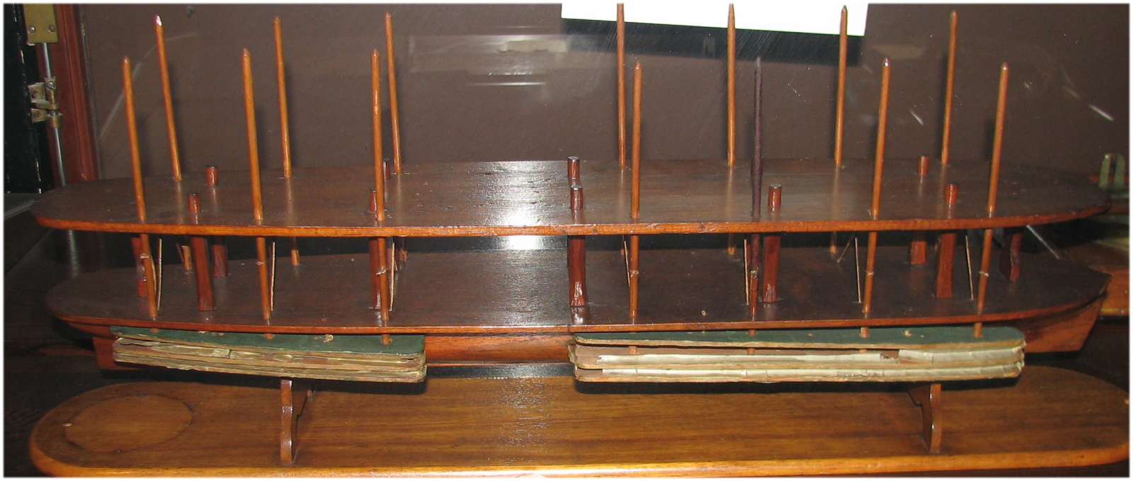 Replica of Lincoln's scale model of boat. Pontoons are in the foreground, deflated.