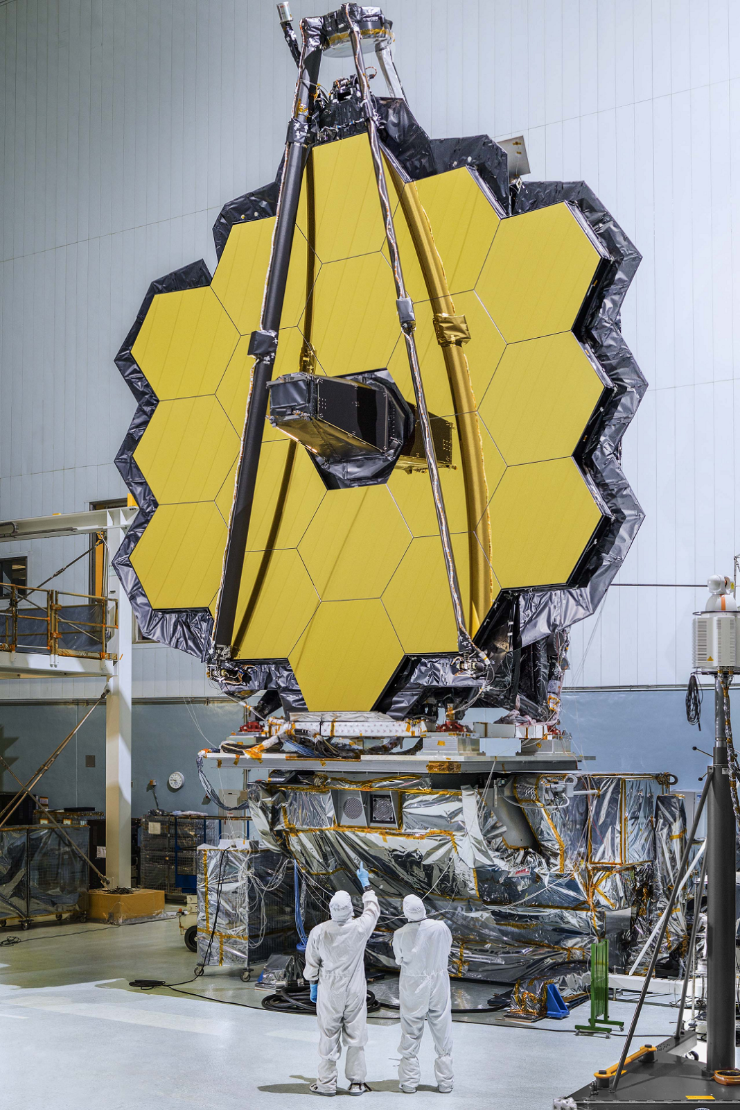The primary mirror arrangement of the James Webb Space Telescope, set to launch in 2021.  Eighteen hexagonal mirror segments combine to form a massive 'light bucket' with five times the area of Hubble.  Due to its heat sensitivity, the JWST will reside away from Earth vicinity, which will all but preclude visiting astronauts for repair and maintenance.  Incredibly complex but highly capable, the JWST should be a most worthy successor to the Hubble.