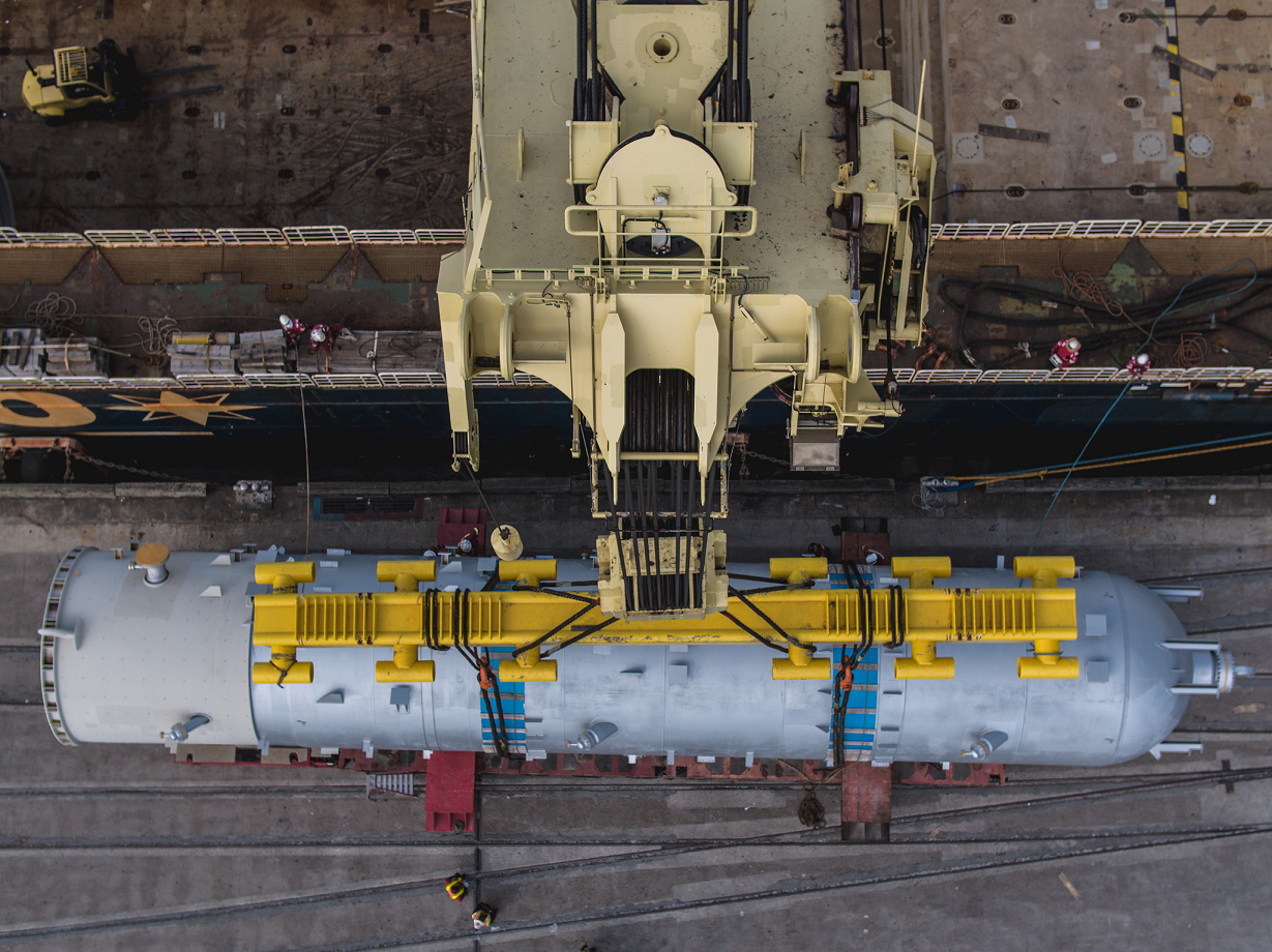 Top View of Heavy Lift Crane with Refinery Equipment Cargo 'On the Vessel Crane's Hook'