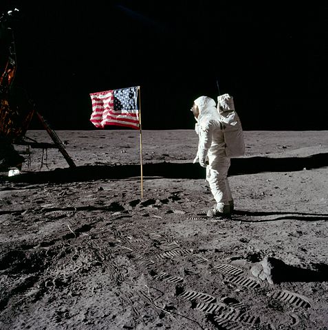 Buzz salutes the US flag on the moon