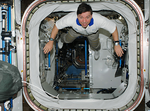 Astronaut Michael Barratt hovers