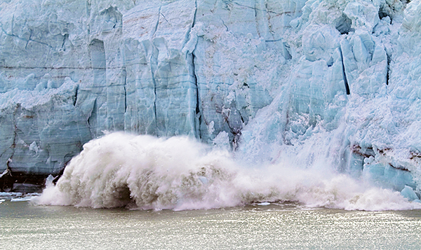 Ice breaking away from a glacier