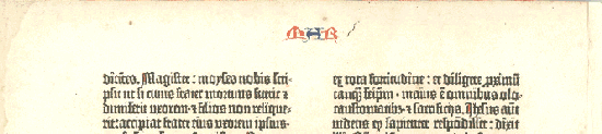 Top of a Gutenberg Bible printed in 1455 or 1456. This page is a nearly perfect imitation of the 225-year-old manuscript page above. It doesn't have blue lines to guide the scribe, and it is printed on paper.