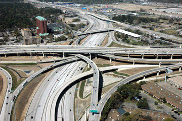 a photograph depicting the nearly completed Katy Freeway as it intersects another major freeway