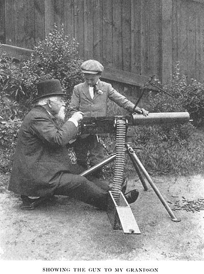 Chilling image of Maxim showing his gun off to his grandson