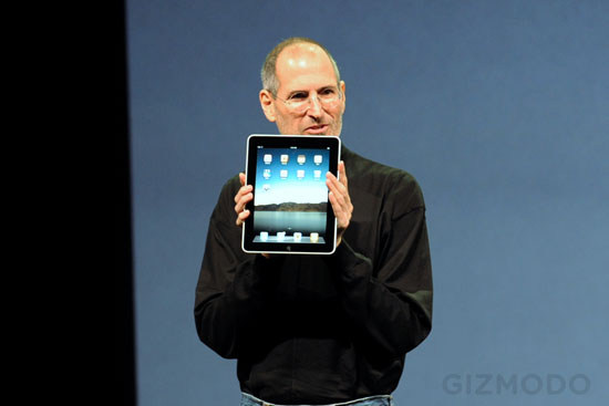 Steve Jobs holding iPad