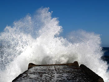 Wave striking a pier
