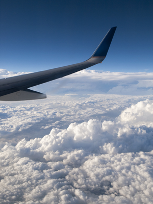 Wing and clouds